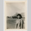 Nisei woman poses in front of Castle Rock (ddr-densho-325-138)
