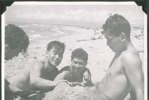 Soldiers relaxing on the beach (ddr-densho-201-635)