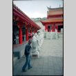 Man walking in temple courtyard (ddr-densho-426-469)