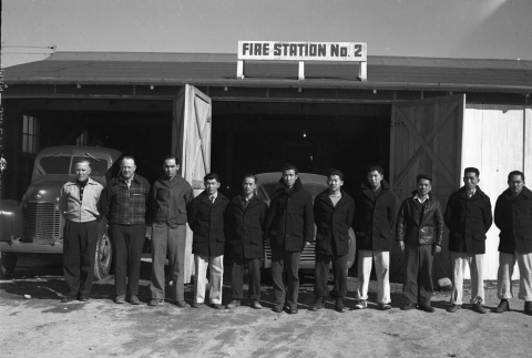 Firemen standing in front of Fire Station No. 2 (ddr-fom-1-757)