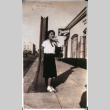 Woman on sidewalk (ddr-densho-1007-617)