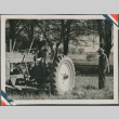A man driving a tractor (ddr-densho-201-938)