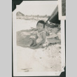 Young girl on beach (ddr-densho-355-516)
