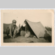 Soldier setting up tent (ddr-densho-368-134)