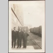 Issei men at train depot (ddr-densho-259-145)