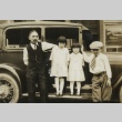 Family in front of car (ddr-densho-128-67)