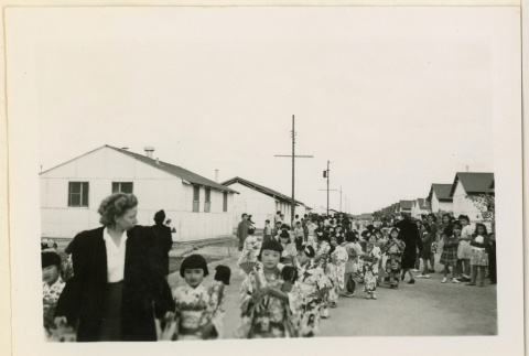 Girls in kimonos carrying dolls (ddr-densho-37-1288)
