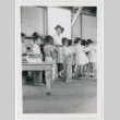 Students turning in their books (ddr-densho-37-2136)