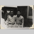 Two men standing outside barracks (ddr-densho-466-855)