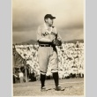 Babe Ruth on the playing field, wearing a lei (ddr-njpa-1-1403)