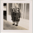 Two girls standing outside business (ddr-densho-426-27)
