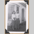 Woman and man outside a building (ddr-densho-542-313)