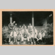 People sitting in front of house (ddr-densho-468-288)