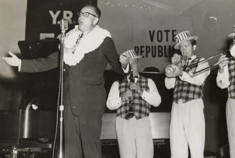William F. Quinn singing with three musicians at a campaign event (ddr-njpa-2-1014)