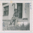 Lawrence Miwa poses on porch (ddr-densho-437-1)