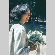 Jeri Endo holding a bouquet at her wedding (ddr-densho-336-1159)