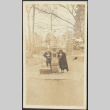 A man and woman drinking from water fountains (ddr-densho-278-117)