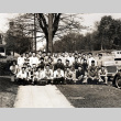 Group photo of members of SYNKOA, the Japanese Student organization at the University of Washington (ddr-densho-474-246)
