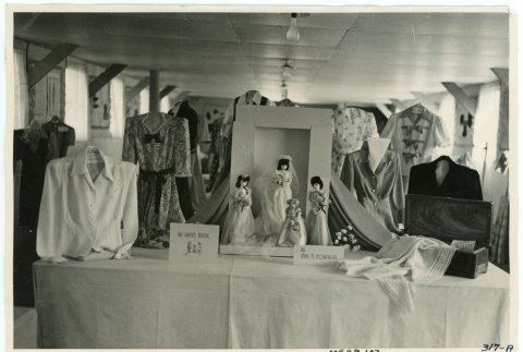 Photograph of a display of handmade clothing created by Mrs. N. Itokawa (ddr-csujad-47-71)
