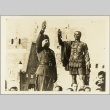 Mussolini giving a salute next to a statue of Caesar (ddr-njpa-13-681)