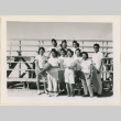 Girl's basketball team standing (ddr-densho-37-1070)