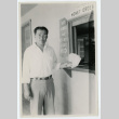 Man at money order counter (ddr-densho-37-2154)