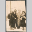 Group of five people standing in snow (ddr-densho-523-33)
