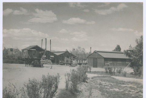 Poston camp with four buildings (ddr-densho-458-95)