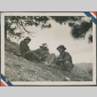 Three men sitting around a fire (ddr-densho-201-939)