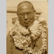 Man wearing leis (ddr-njpa-4-2219)