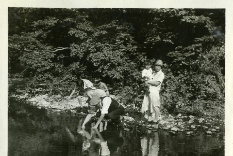 Children playing in creek (ddr-densho-182-42)