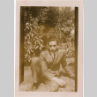 Man seated in garden (ddr-densho-426-1473)