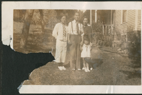 Okubo family in yard outside house (ddr-densho-316-385)