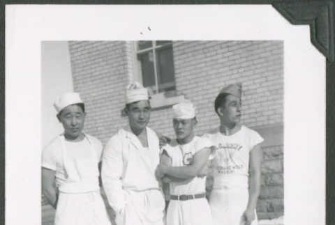 Four mess workers at Fort Snelling (ddr-densho-328-64)