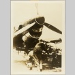 Men working next to a plane (ddr-njpa-13-849)
