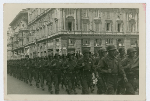 Soldiers marching in city street (ddr-densho-368-87)