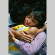 Stephanie Ide hugging a fellow camper (ddr-densho-336-1496)