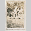Man sitting on another man (ddr-densho-316-288)