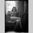 Blurry image of young woman in chair (ddr-densho-475-120)