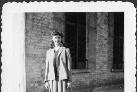 Woman standing on steps (ddr-densho-434-448)