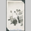 Group of four with a snowman (ddr-densho-321-134)