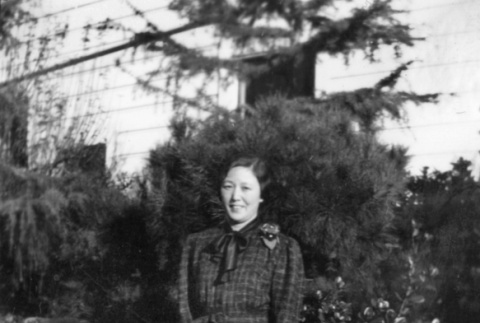 Chiyoko Kono standing in garden (ddr-ajah-6-270)
