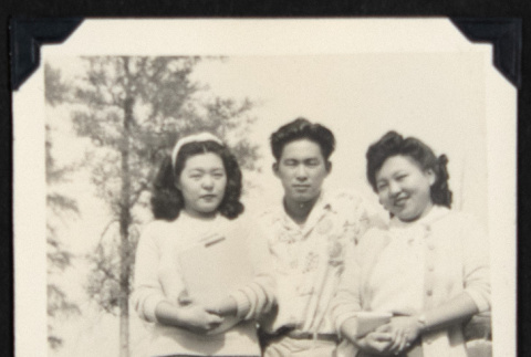 Gary Kikawa and two young women (ddr-densho-542-710)