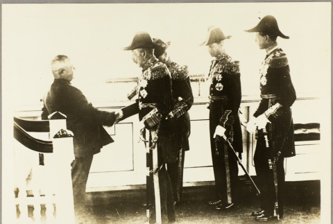 A man greeting dignitaries on the HMY Victoria and Albert (ddr-njpa-13-560)