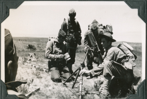 Four men with mortar (ddr-ajah-2-98)