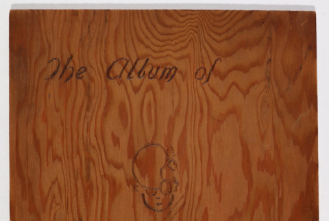 Photo album -- wood covers (ddr-densho-468-263)