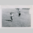 Two boys play on lawn (ddr-densho-359-1521)