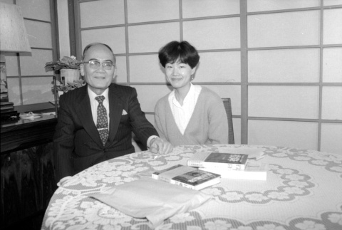 Kiyofumi Kojima and interpreter at table (ddr-densho-1007-577)