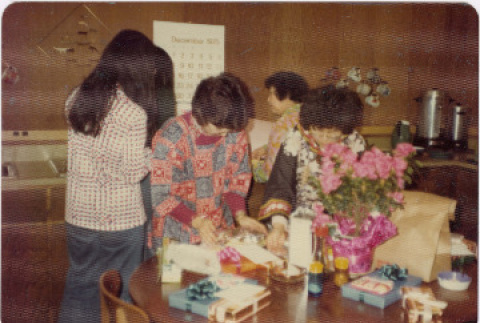 Group of women wrapping packages (ddr-densho-426-126)