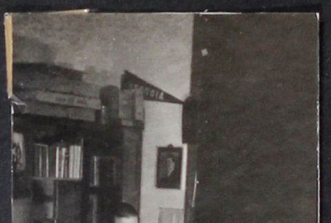 Man with magazine (ddr-densho-468-421)